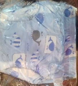 Enfant dormant avec l'oreiller Le P'tit Loup